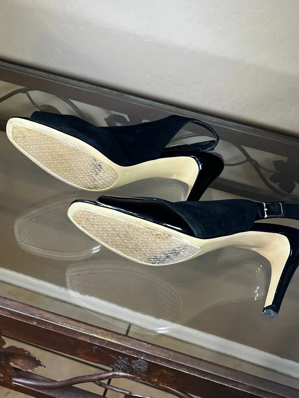 Open toed black leather heels